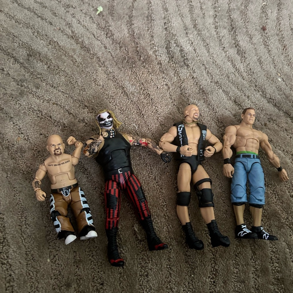 WWE Action Figures Set - Black, Red, Blue, Brown